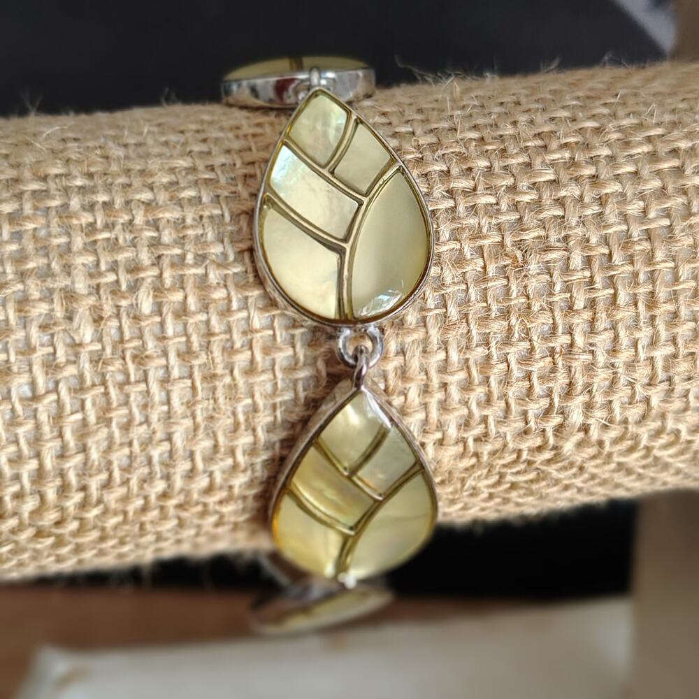 BEAUTIFUL LIA SOPHIA SILVERTONE AND MOTHER OF PEARL LEAF BRACELET - 7 INCHES